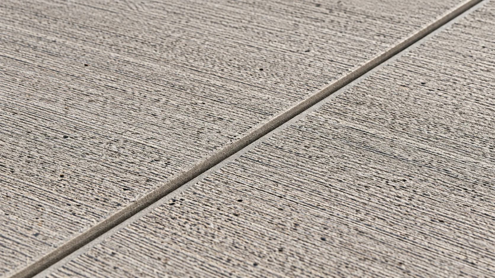 Close view of broom-finished concrete aggregate